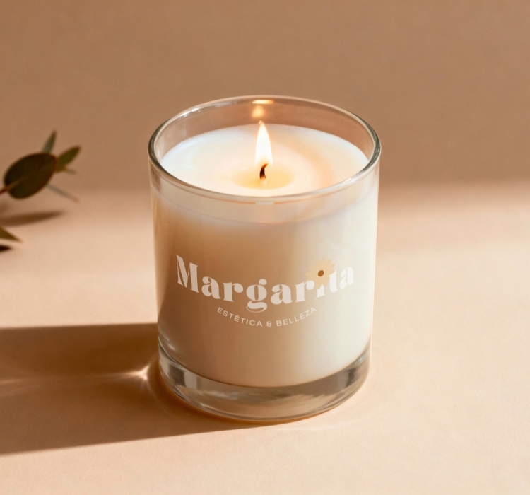 Margarita beauty center branded scented candle in clear glass jar